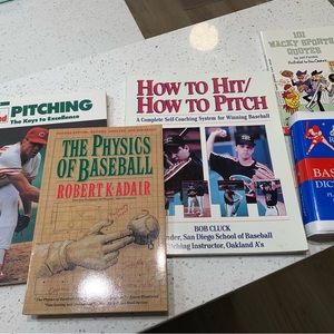 Five paperback books about baseball.